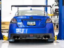 OLM Evolution Tail Lights Clear Lens Black Base White Bar 15+ WRX STI