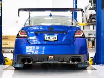 OLM Evolution Tail Lights Clear Lens Black Base White Bar 15+ WRX STI