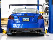 OLM Evolution Tail Lights Smoked Lens Black Base Red Bar 15+ WRX STI